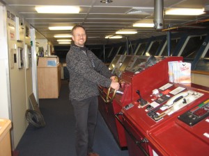 The bridge - 'Capt' Paul at the wheel